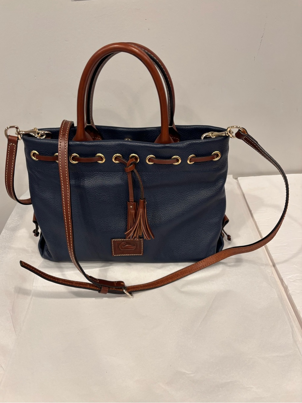 Dooney & Bourke Navy and Brown Leather Drawstring Tote
